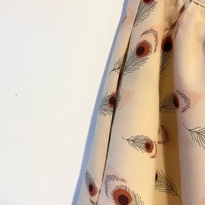 Forever 21 “Boutique XXI” peacock print mini skirt
